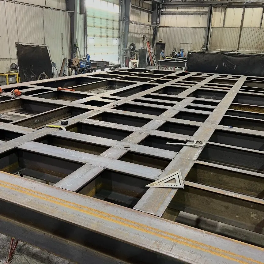 Custom fabricated steel skid frame with precision welded joints